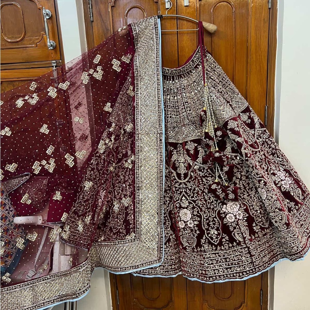 Elegant Maroon and gold Embroidered Lehenga